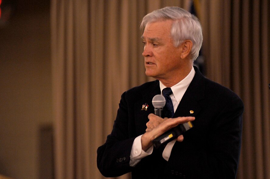 Retired Lt. Col. Barry Bridger, North Vietnam Prisoner of War survivor, speaks about the torture he endured while being a POW for six years in the Hanoi Hilton Prison Camp Oct. 27 at the Northern Lights Club on Grand Forks AFB.  Colonel Bridger was in the Grand Forks area sharing his POW story with the local community; he also travels around the world sharing his experience. (U.S. Air Force photo by Senior Airman Amanda N. Stencil)