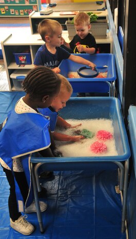 Toddlers at the Child Development Center play together on Joint Base Charleston-Air Base, S.C., Oct. 27, 2010. Parents of children enrolled in the CDC, Youth Center and Family Child Care are welcome to attend quarterly Parent Advisory Board meetings to provide feedback on how programs and activities are planned. The most recent meeting was held Oct. 21. (U.S. Air Force photo/Airman Jared Trimarchi)