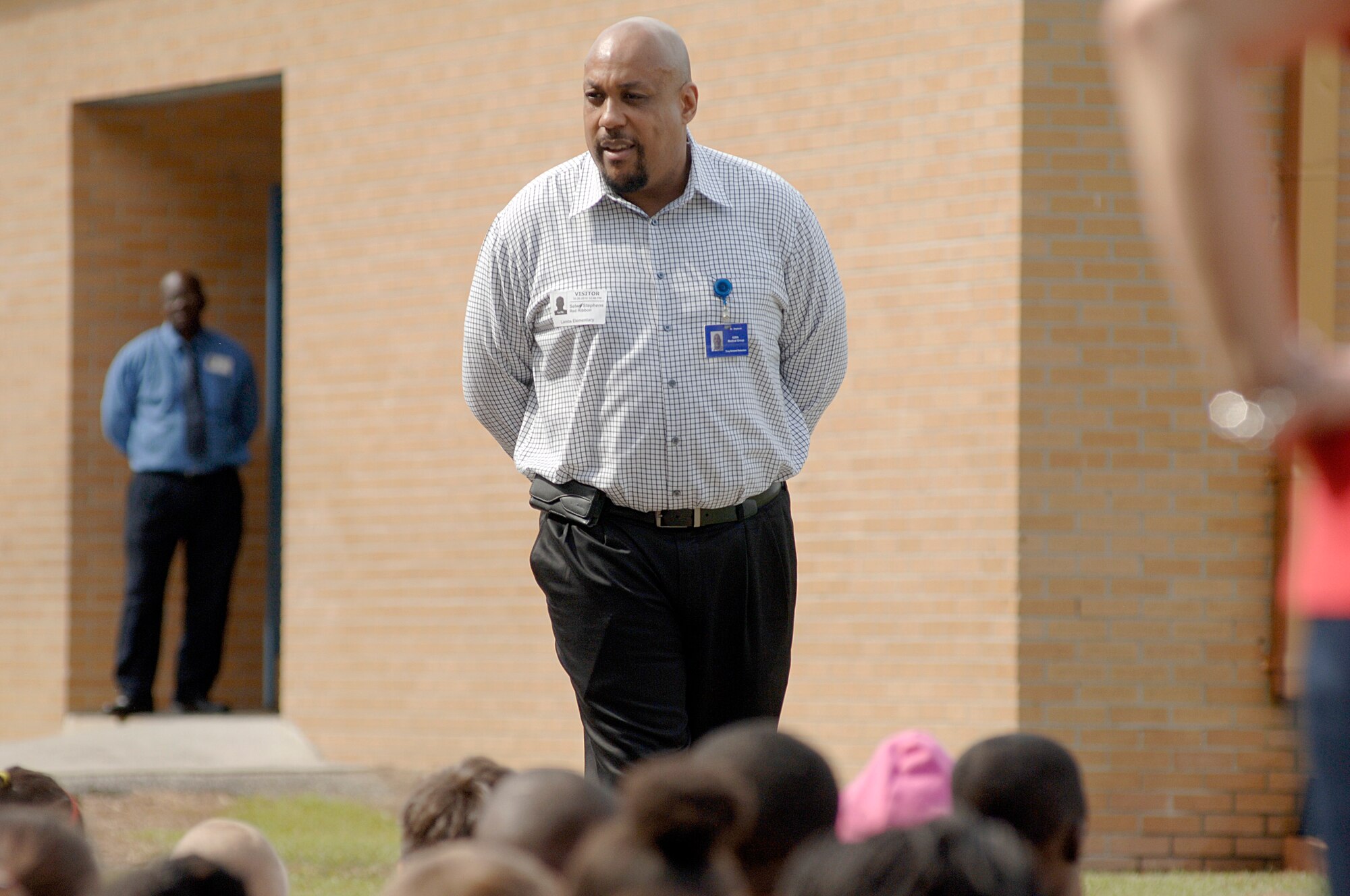 Mr. Selwyn Stephens talks to students and faculty at Lambs Elementary School about the consequences of using drugs during Red Ribbon Week Oct. 26, 2010. Members of Joint Base Charleston visited local elementary schools during the week-long campaign to raise public awareness and mobilize communities to combat tobacco, alcohol and drug use. Mr. Stephens is assigned to the 628th Medical Group as the drug demand reduction program manager. (U.S. Air Force photo/Staff Sgt. Marie Brown)