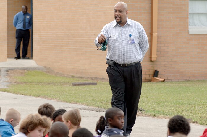 Mr. Selwyn Stephens talks to students and faculty at Lambs Elementary School about the consequences of using drugs during Red Ribbon Week Oct. 26, 2010. Members of Joint Base Charleston visited local elementary schools during the week-long campaign to raise public awareness and mobilize communities to combat tobacco, alcohol and drug use. Mr. Stephens is assigned to the 628th Medical Group as the drug demand reduction program manager. (U.S. Air Force photo/Staff Sgt. Marie Brown)
