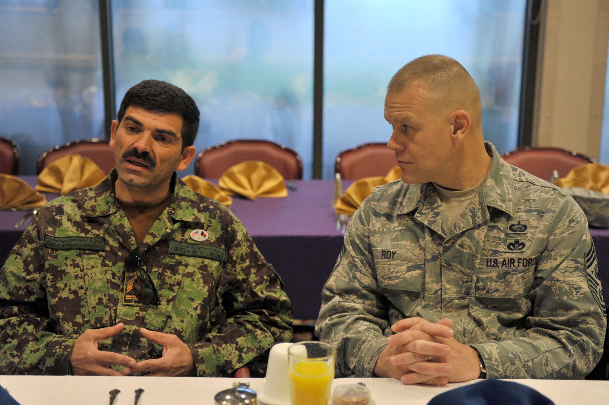 Chief Master Sgt. of the Air Force James A. Roy speaks with Eid Mohammad, the command sergeant major of the Afghan air force, Oct. 27, 2010, at Lackland Air Force Base, Texas. (U.S. Air Force photo/Staff Sgt. Desiree Palacios)