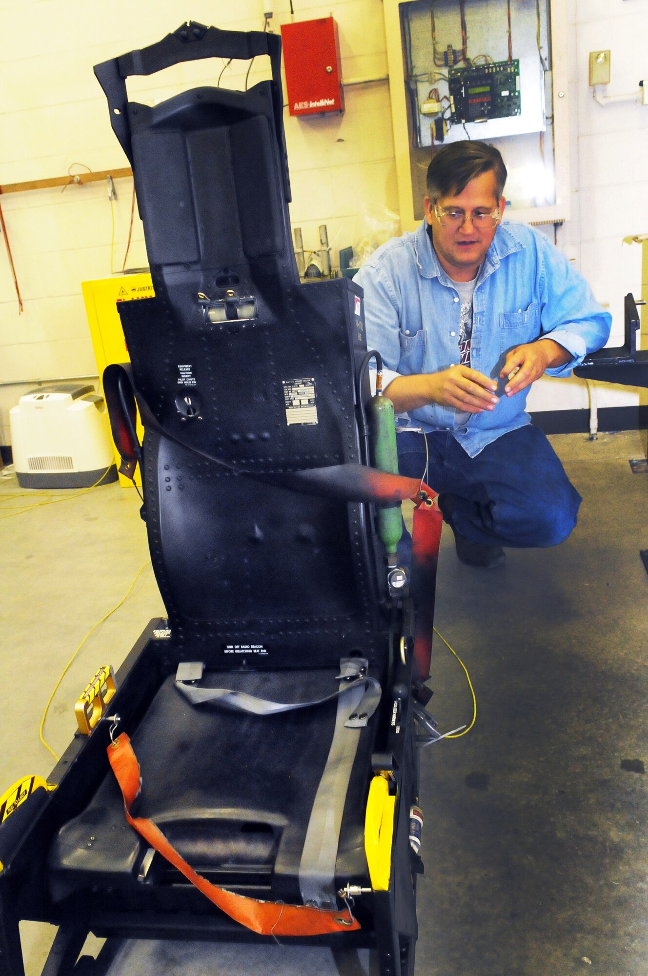 Phil Welch talks about how the ACES II seat works. U. S. Air Force photo by Sue Sapp
