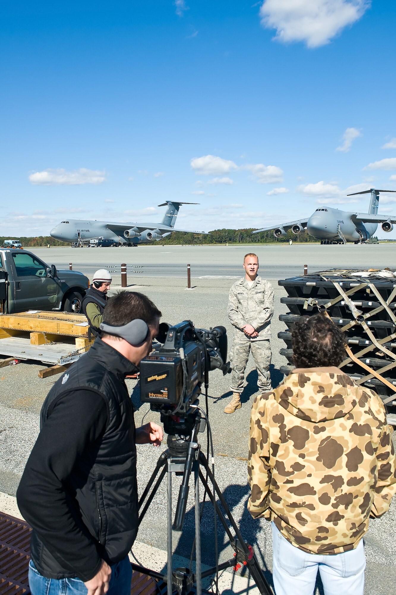 (UNRELEASED) A film crew for the televison show "Modern Marvels" interviews 1st Lt. Troy Barnes, 436th Aerial Port Squadron, Dover Air Force Base, Del., October 21. (U.S. Air Force photo/Roland Balik)