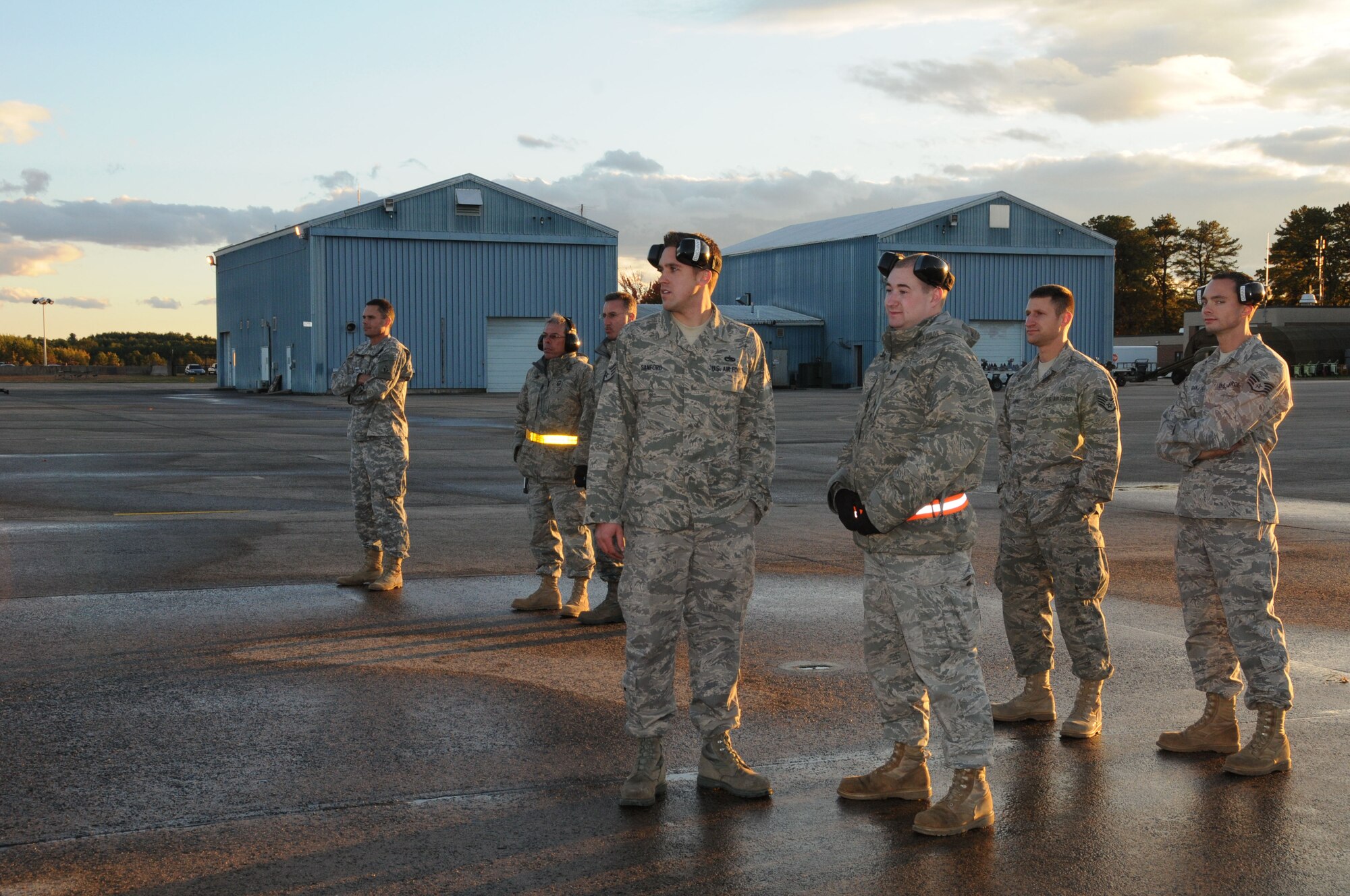Members of the 103rd Airlift Wing observe the new C27J Spartan upon its arrival to the Bradley Air National Guard Base in East Granby, Conn. on Thursday, Oct. 21, 2010.  The aircraft visit afforded the Flying Yankees of the 103rd Airlift Wing an opportunity to experience its future mission capabilities first hand.  (U.S. Air Force photo by Tech. Sgt. Erin E. McNamara)