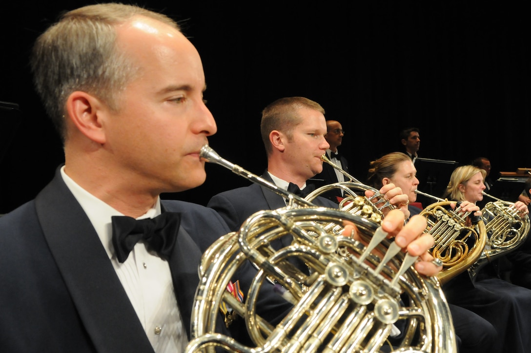 LAMPETER, Pa. -- French horn players in the U.S. Air Force Band perform Oct. 16 at Lampeter-Strasburg High School in Lampeter, Pa. The performance is the eleventh in the band’s three-week 2010 Fall Tour. (U.S. Air Force photo by Senior Airman Christopher Ruano) 