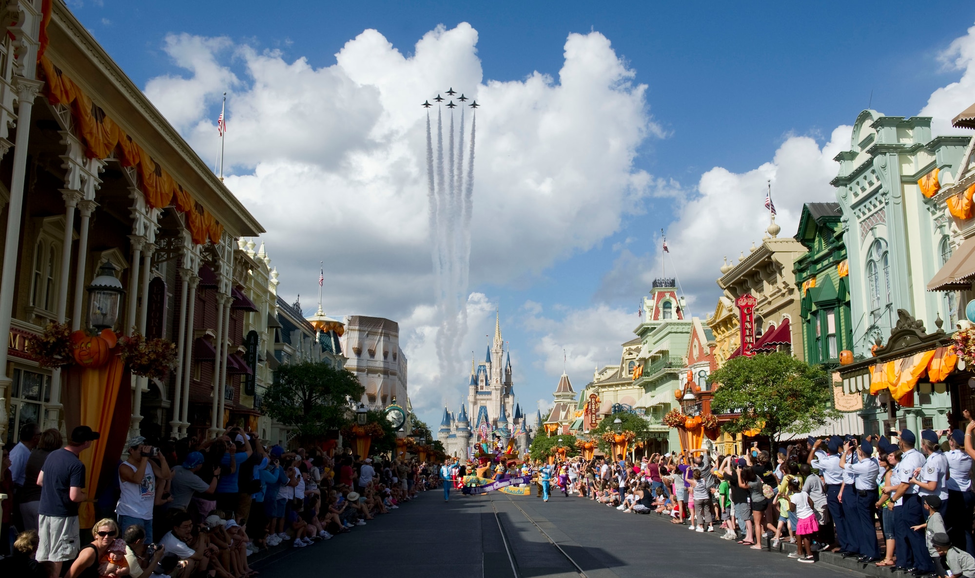 The Thunderbirds, the U.S. Air Force air demonstration team, fly the delta formation over Cinderella's Castle and main street at Disney World in Orlando, Fla., Oct. 26, 2010. Central Florida celebrates Air Force Week with a magical tribute to the local community and military. The theme park dedicated an entire day of events to Air Force servicemembers and their families.  (U.S. Air Force photo/Staff Sgt. Larry E. Reid Jr.)