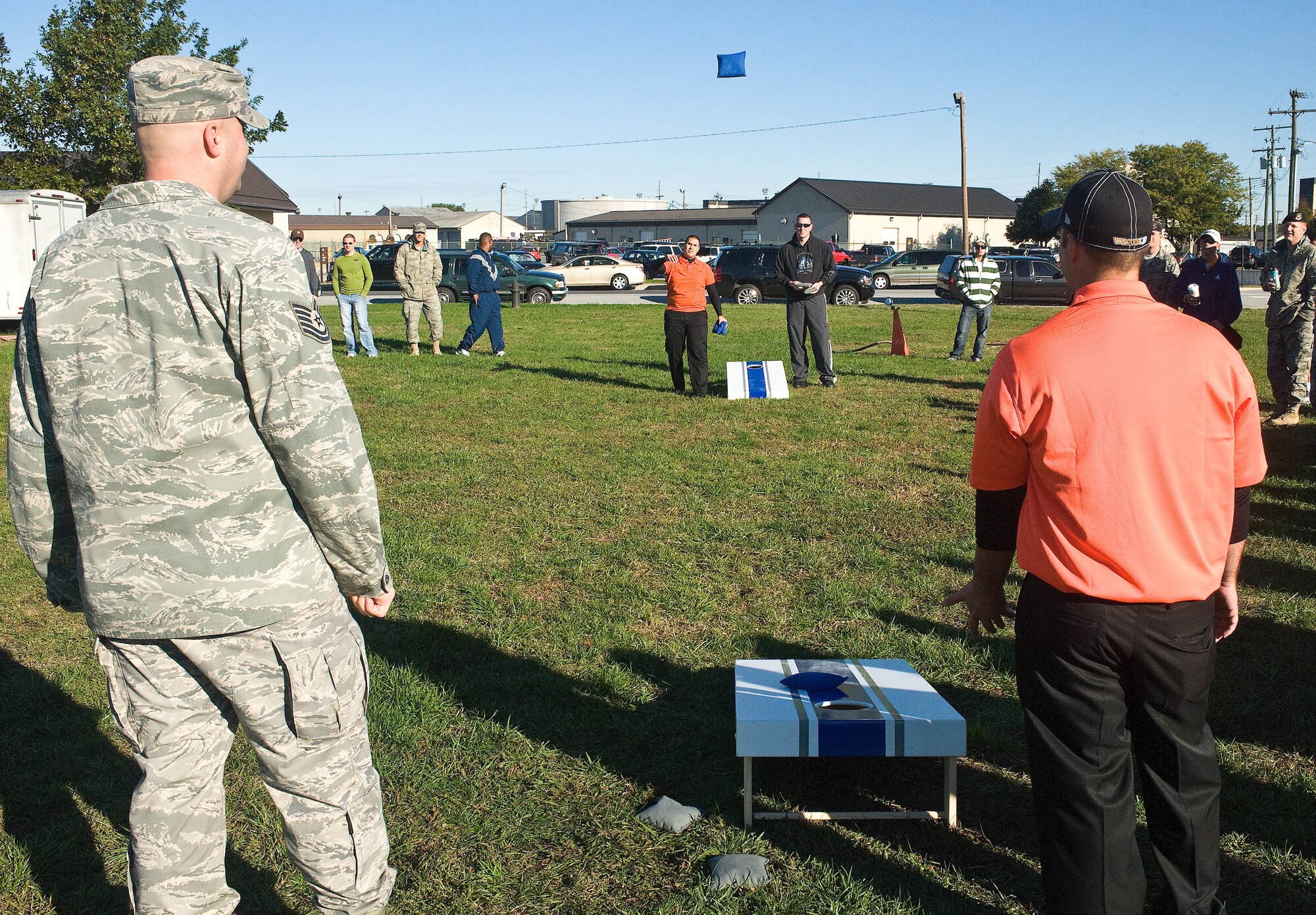 The 373rd Training Squadron, Detachment 3, plays in Cornhole tournament against the 436th Security Forces Squadron during Fall Wing Sports Day at the Fitness Center, Dover Air Force Base, Del., Oct. 22, 2010. Cornhole is a sport very similar to horseshoes. (U.S. Air Force photo by Roland Balik/Released)