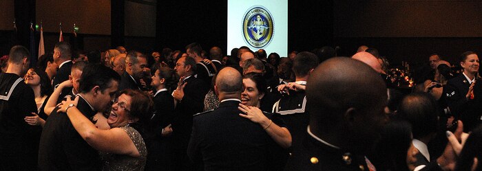 CHARLESTON, SC (October 23, 2010) Military members dance the night away to the live entertainment of ?The Cool? during the Joint Base Charleston Military Ball held Oct. 23, 2010 at the North CHS Convention Center. (U.S. Navy photo/Mass Communication Specialist 1st Class Jennifer R. Hudson)
