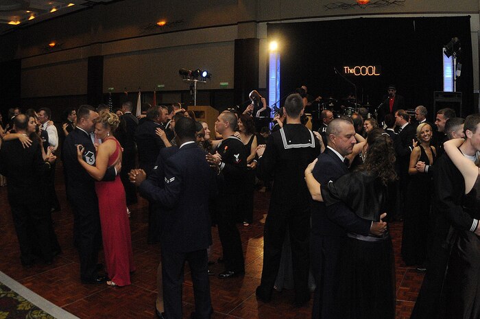 CHARLESTON, SC (October 23, 2010) Military members and their partners dance the night away to the live  musical entertainment of ?The Cool? during the Joint Base Charleston Military Ball held at the North CHS Convention Center, Oct. 23, 2010. (U.S. Navy photo/Mass Communication Specialist 1st Class Jennifer R. Hudson)