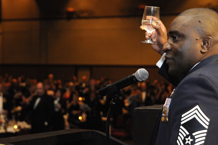 CHARLESTON, SC (October 23, 2010) Chief Master Sgt. Thomas Jackson Jr., raises his glass for a toast during the first Joint Base Charleston Military Ball held at the North CHS Convention Center, Oct. 23, 2010. Chief Jackson is with the Air Mobility Command 628th Mission Support Group on Joint Base Charleston-Air Base. (U.S. Navy photo/Mass Communication Specialist 1st Class Jennifer R. Hudson)