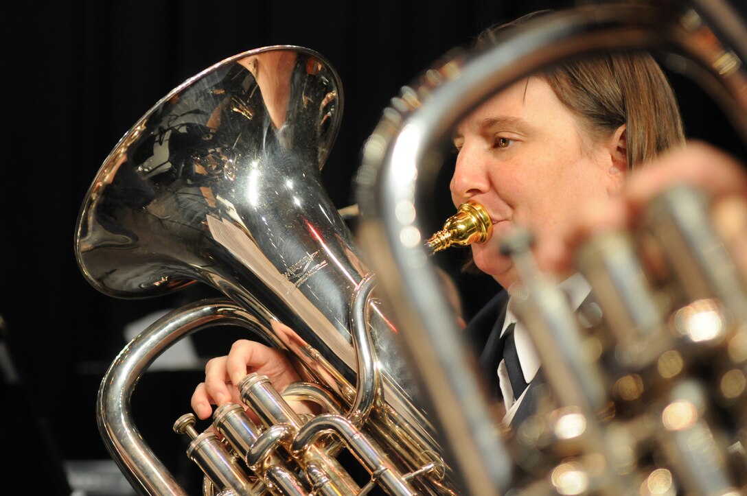 EAST BRUNSWICK, N.J.-- Master Sgt. Jennifer Cox, U.S. Air Force Band member, plays the euphonium Oct. 13 at Hammarskjold Middle School, East Brunswick, N.J. The performance is the eighth on the band’s three-week 2010 Fall Tour. (U.S. Air Force photo by Senior Airman Christopher Ruano)