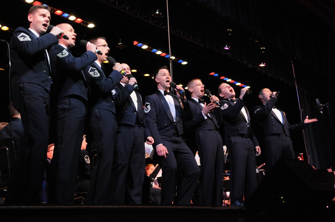 POUGHKEEPSIE, N.Y. -- Members of the Singing Sergeants sing a barber-shop melody Oct. 9 at Poughkeepsie High School, Poughkeepsie, N.Y. The performance is the fourth of the band’s three-week 2010 Fall Tour. (U.S. Air Force photo by Senior Airman Christopher Ruano)