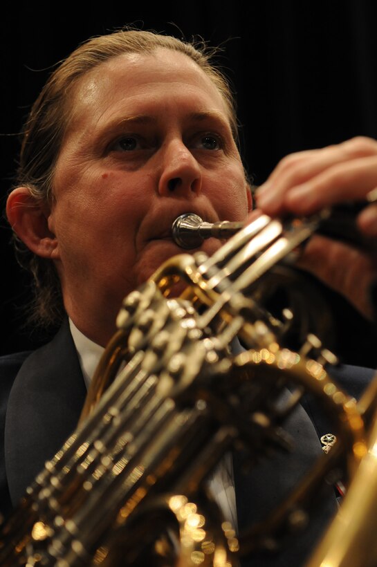 NEWBURGH, N.Y.-- Master Sgt. Lisa Maloney, U.S. Air Force Band member, plays the French Horn Oct. 8 at Newburgh Free Academy, Newburgh, N.Y. The performance is the third on the band’s three-week 2010 Fall Tour. (U.S. Air Force photo by Senior Airman Christopher Ruano)