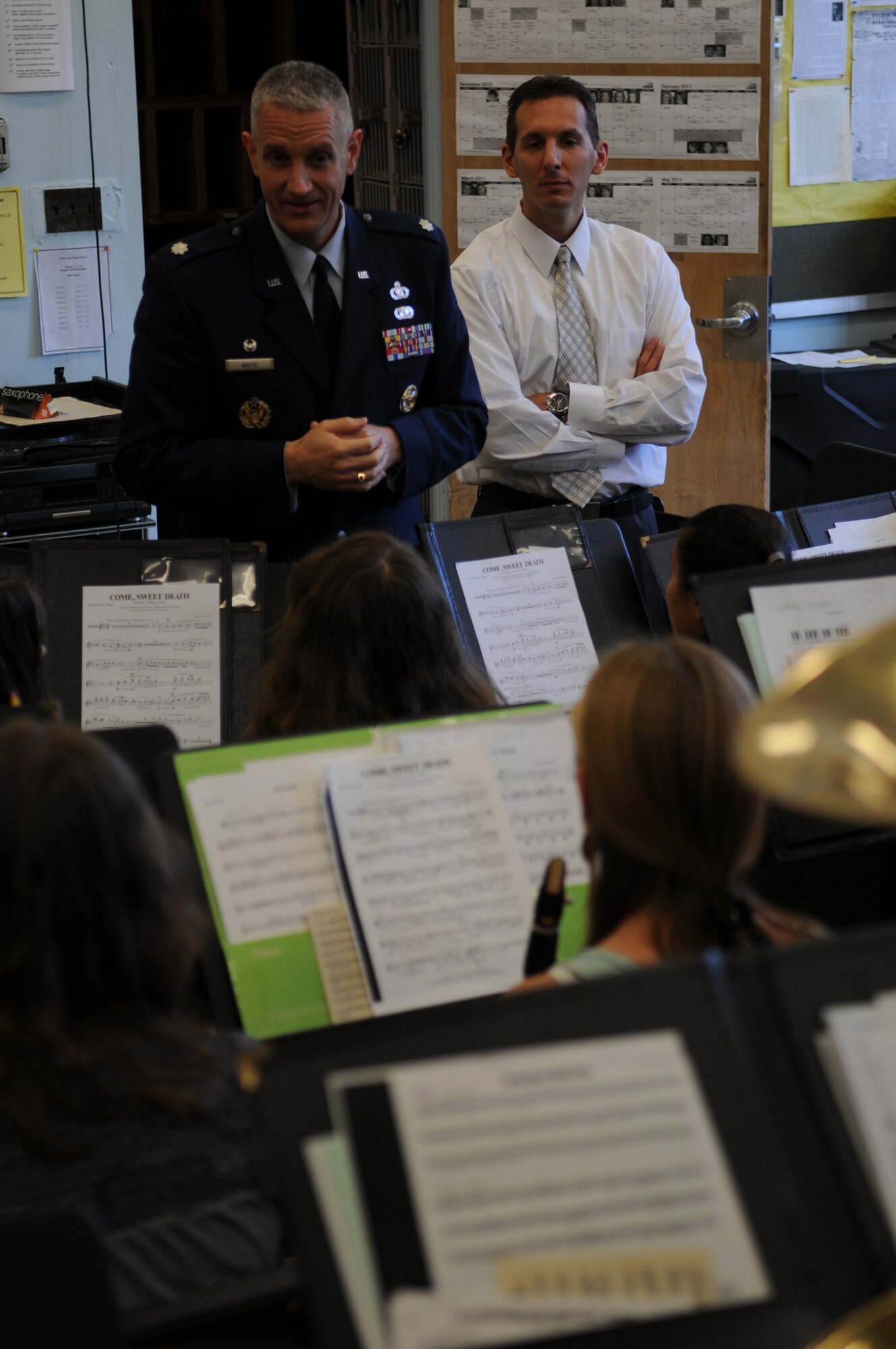 OYSTER BAY, N.Y. -- Lt. Col. A. Phillip Waite, commander and conductor, U.S. Air Force Band, assists in instructing an Oyster Bay High School band class Oct. 7 in Oyster Bay, NY. Working with the students allows the commander to reach out to the youth in the local community. (U.S. Air Force Photo by Senior Airman Christopher Ruano)