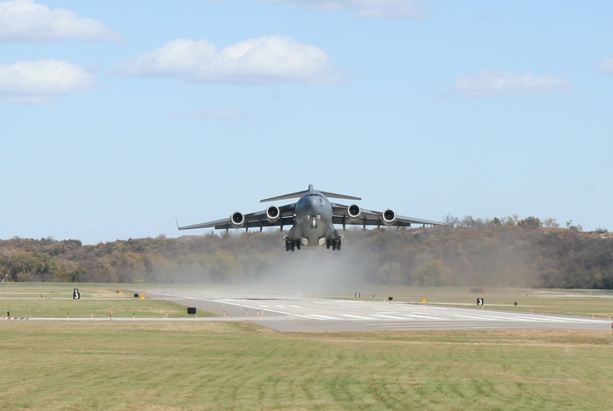 FORT RILEY, Kan. – A C-17 from Altus Air Force Base, Okla. takes off from Fort Riley Oct. 26. The crew was visiting Marshall Army Airfield to evaluate the airfield to see if it would meet their training requirements. The crew was assessing MAA as a training site for short take-off landings. (U.S. Army photo)