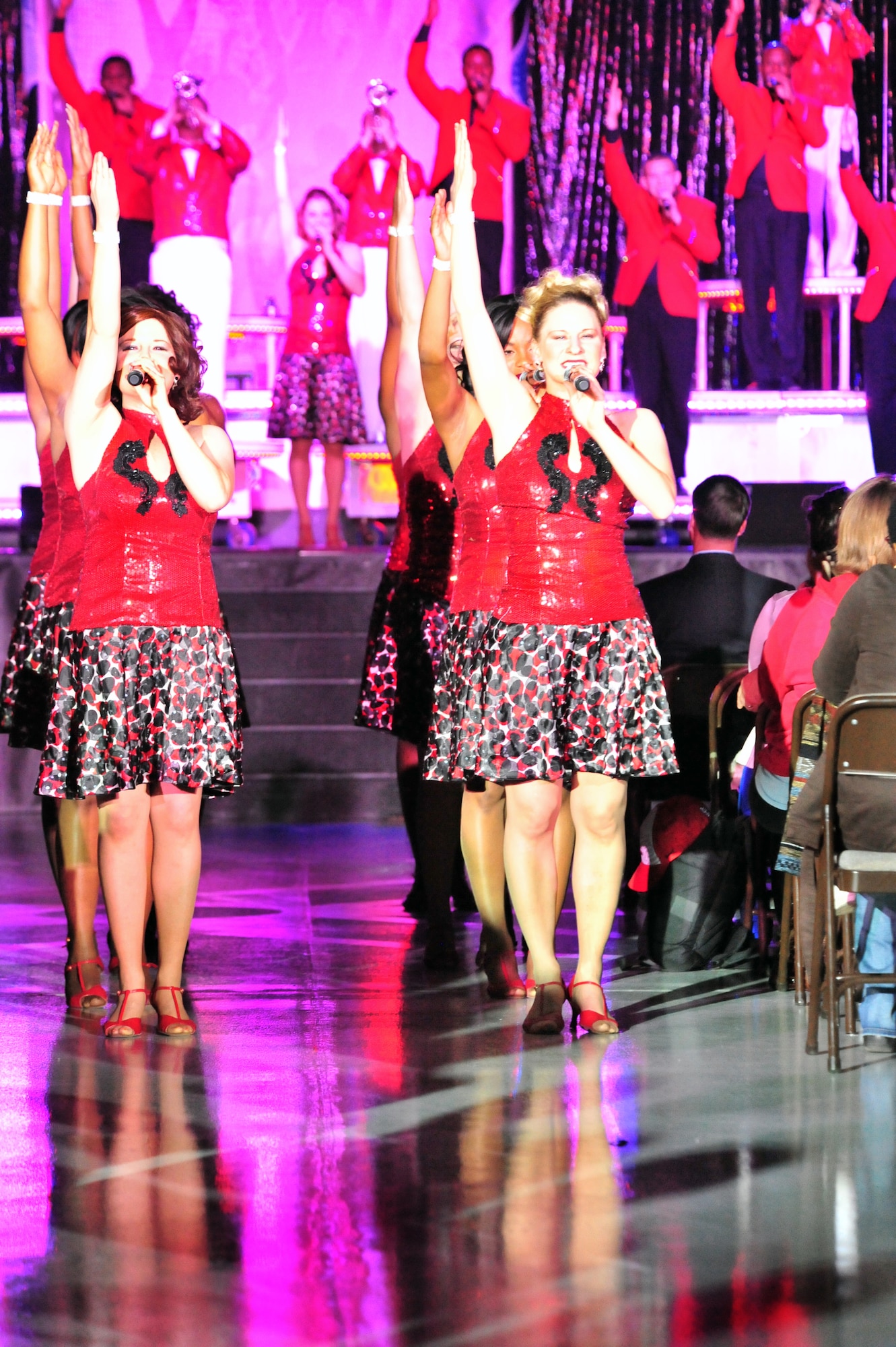 101023-F-8430J-087
SHAW AIR FORCE BASE, S.C. - Technical Sgt. Katie Badowski (right), and Senior Airman Lacy Jones (left), Tops in Blue performers, sing Oct. 23, 2010. Tops in Blue entertains Airmen and their families, coalition partners and audiences around the world with musical theatrics. Their tour includes more than 80 shows worldwide, many for deployed service members in the Southwest Asia area of operations. (U.S. Air Force photo/Airman 1st Class Amber E. N. Jacobs (Released))
