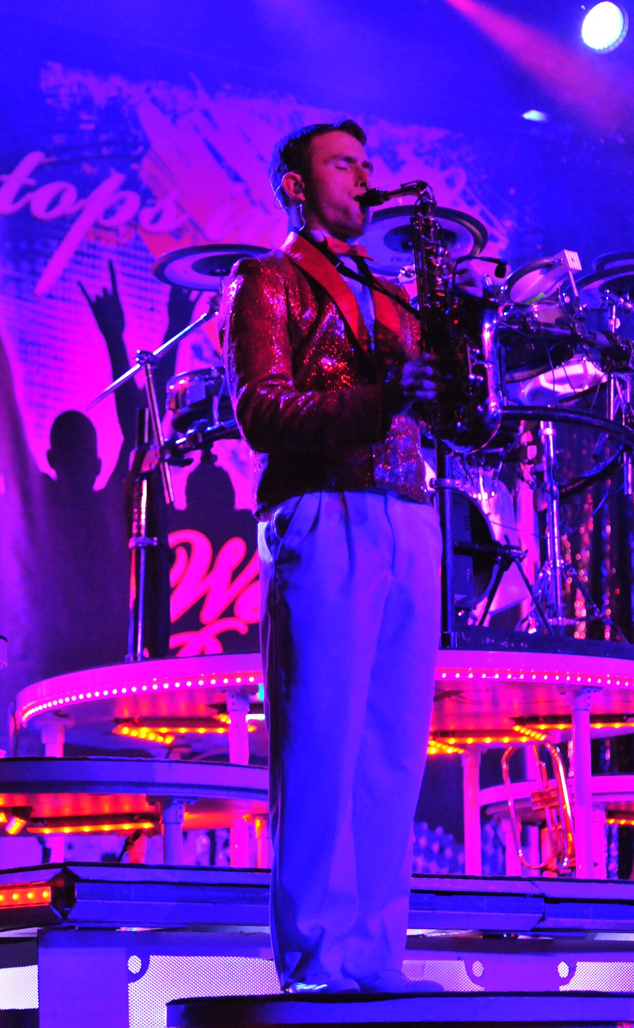 101023-F-8430J-078
SHAW AIR FORCE BASE, S.C. - Staff Sgt. Steven Brumley, Tops in Blue performer, plays his saxophone during the opening song Oct. 23, 2010. Tops in Blue entertains Airmen and their families, coalition partners and audiences around the world with musical theatrics. Their tour includes more than 80 shows worldwide, many for deployed service members in the Southwest Asia area of operations. (U.S. Air Force photo/Airman 1st Class Amber E. N. Jacobs (Released))
