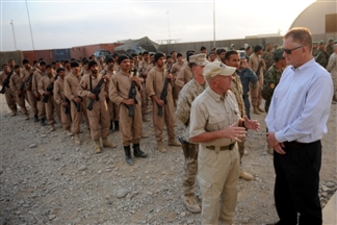 Deputy Secretary of Defense William J. Lynn III tours the Joint Security Academy Southwest in Afghanistan on Oct. 27, 2010.  The Joint Security Academy Southwest is a training facility where U.S. Marines and Navy corpsmen train Afghan soldiers and police during an eight-week course covering explosive ordinance disposal, medical, driving and marksmanship among other things.  