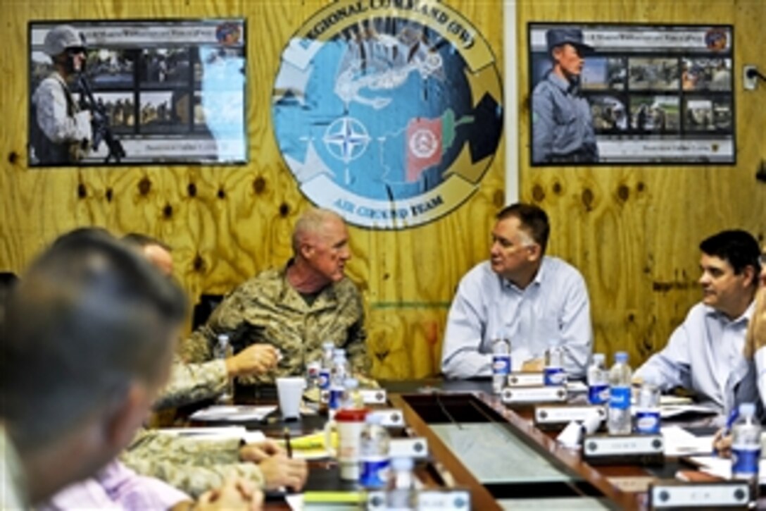 U.S. Deputy Defense Secretary William J. Lynn III meets with U.S. Marine Corps Maj. Gen. Richard P. Mills, commander of Regional Command Southwest in Afghanistan, Oct. 27, 2010.