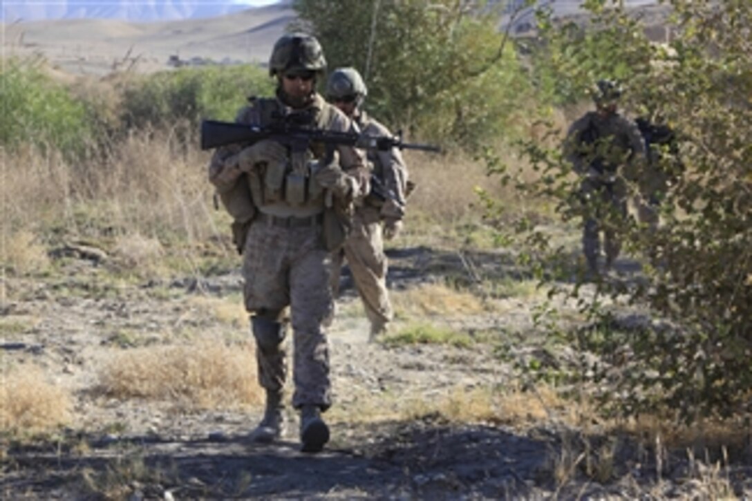U.S. Marines with 3rd Squad, 2nd Platoon, India Company, 3rd Battalion, 12th Marine Regiment patrol in Kajaki, Afghanistan, on Oct. 22, 2010.  The Marines patrolled the area to deter the placement of improvised explosive devices.  