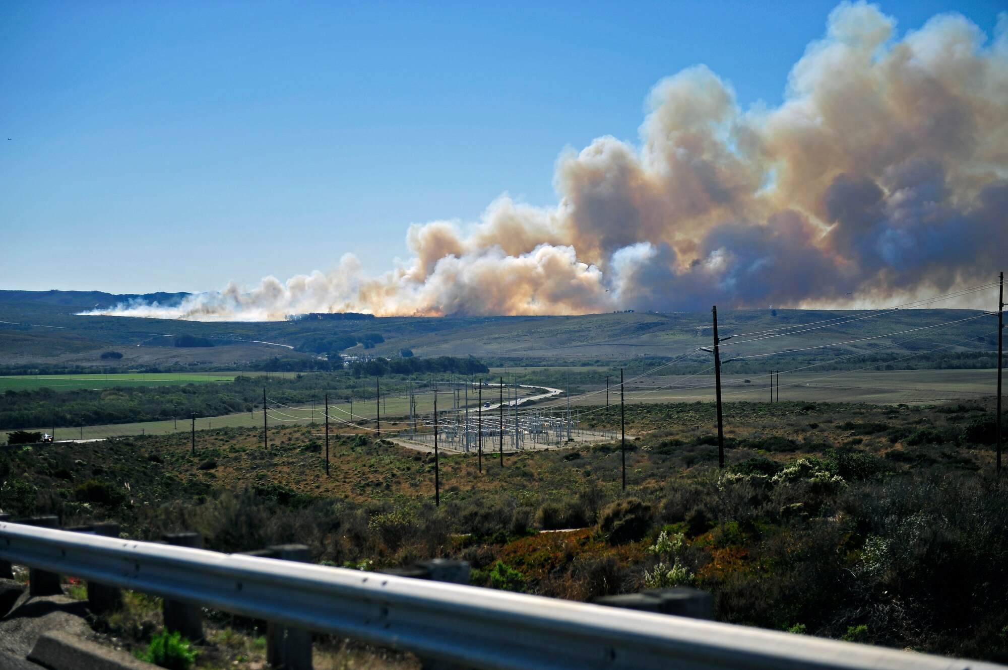 VANDENBERG AIR FORCE BASE, Calif. – The Bear Creek wildfire that erupted here at approximately 1 p.m. Thursday, Oct. 28, 2010, has now burned through more than 400 acres. Approximately 150 firefighters and emergency responders are attempting to contain the blaze with three ground-hand crews, 28 fire engines, seven bulldozers, three helicopters and two fixed-wing aerial tankers. (U.S. Air Force photo/Tech. Sgt. Luke Thelen)