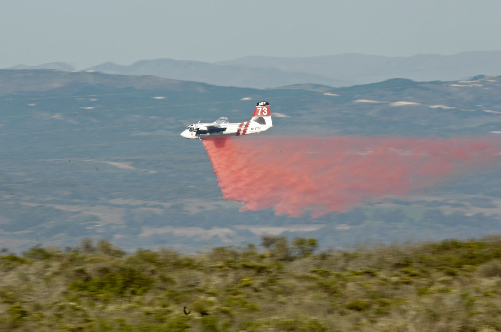 VANDENBERG AIR FORCE BASE, Calif. – The Bear Creek wildfire that erupted here at approximately 1 p.m. Thursday, Oct. 28, 2010, has now burned through more than 400 acres. Approximately 150 firefighters and emergency responders are attempting to contain the blaze with three ground-hand crews, 28 fire engines, seven bulldozers, three helicopters and two fixed-wing aerial tankers. (U.S. Air Force photo/Tech. Sgt. Luke Thelen)
