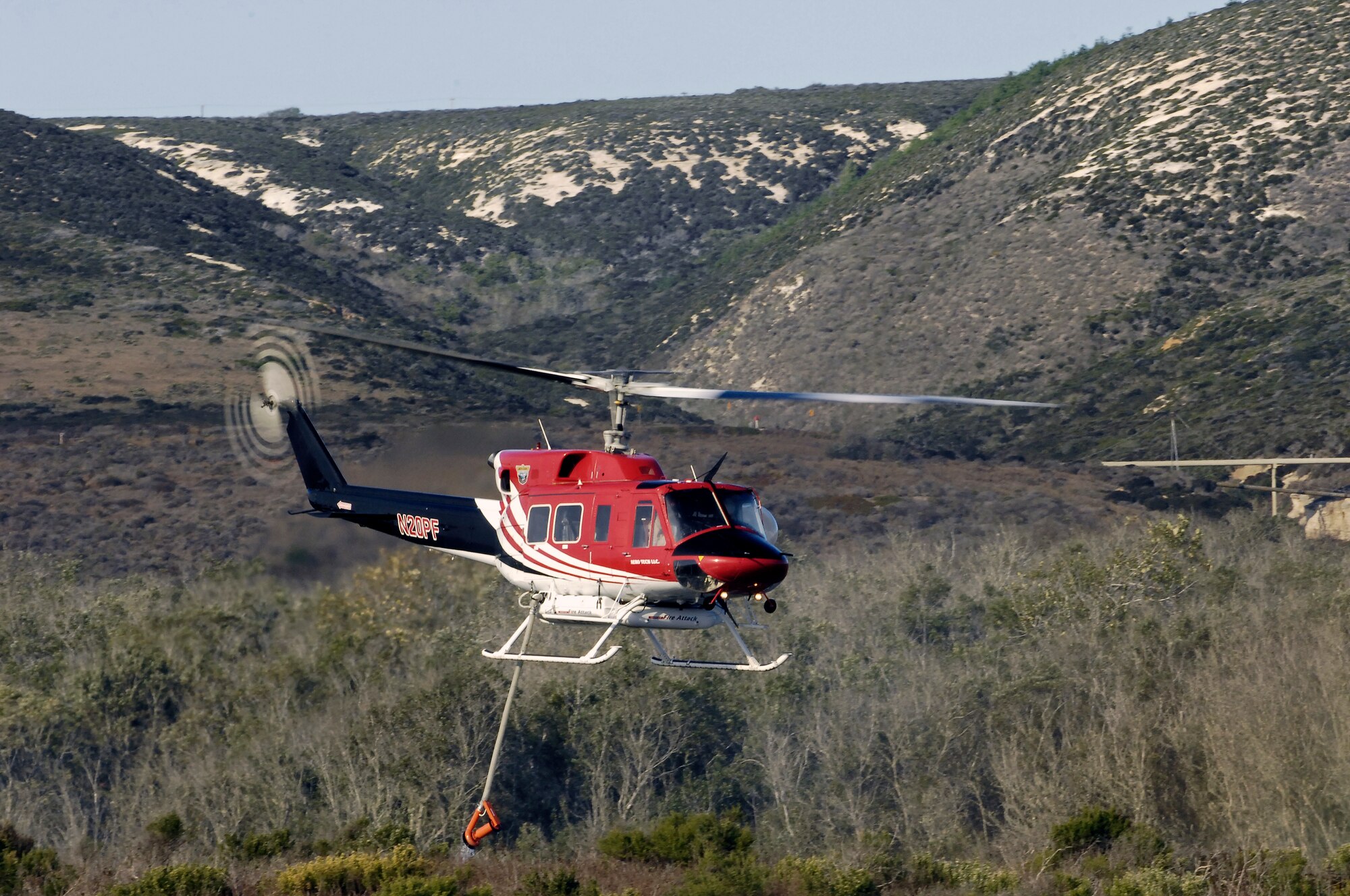 VANDENBERG AIR FORCE BASE, Calif. – The Bear Creek wildfire that erupted here at approximately 1 p.m. Thursday, Oct. 28, 2010, has now burned through more than 400 acres. Approximately 150 firefighters and emergency responders are attempting to contain the blaze with three ground-hand crews, 28 fire engines, seven bulldozers, three helicopters and two fixed-wing aerial tankers. (U.S. Air Force photo/Tech. Sgt. Luke Thelen)