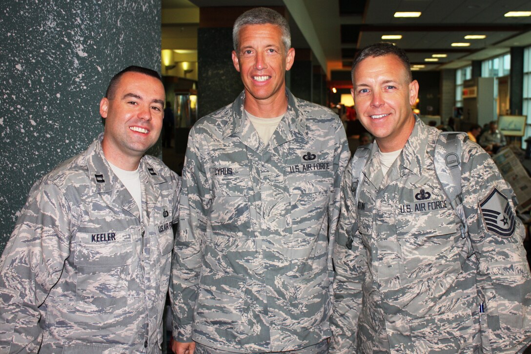 PROVIDENCE, RI:  Captain John Keeler, ANG Band of the Northeast Commander, greets band members returning from a 30 day tour of the AFCENT AOR.  Pictured with Captain Keeler (L) are MSgt Tony Cyrus (C) and MSgt Kevin Martin (R).