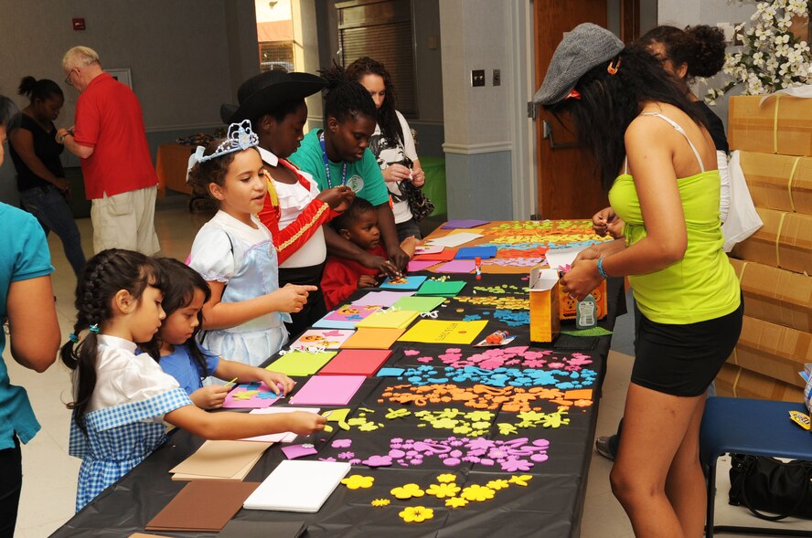 BARKSDALE AIR FORCE BASE, La. -- Children take part in arts-and-crafts during the third annual Trunk-or-treat held at Chapel 2. The activity was held to give kids an alternative way to celebrate Halloween. (U.S. Air Force photo/Airman 1st Class Sean Martin)