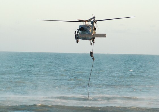 PATRICK AIR FORCE BASE, Fla. - Pararescuemen from the 920th Rescue Wing showcase their rescue skills during a demonstration at the Cocoa Beach Pier during Air Force Week here. The pararescuemen will be performing at the Cocoa Beach Air Show, October 30-31, 2010. PJs go through extensive training to get and maintain their many qualifications. Each PJ is an expert SCUBA diver, mountaineer, marksman and parachutist. Not to mention their main job - to save a life. Throughout their careers they must obtain and maintain emergency medical/paramedic qualifications. This is one of many of the careers offered in the Air Force Reserve. (U.S. Air Force Photo/Staff Sgt. Leslie Kraushaar)