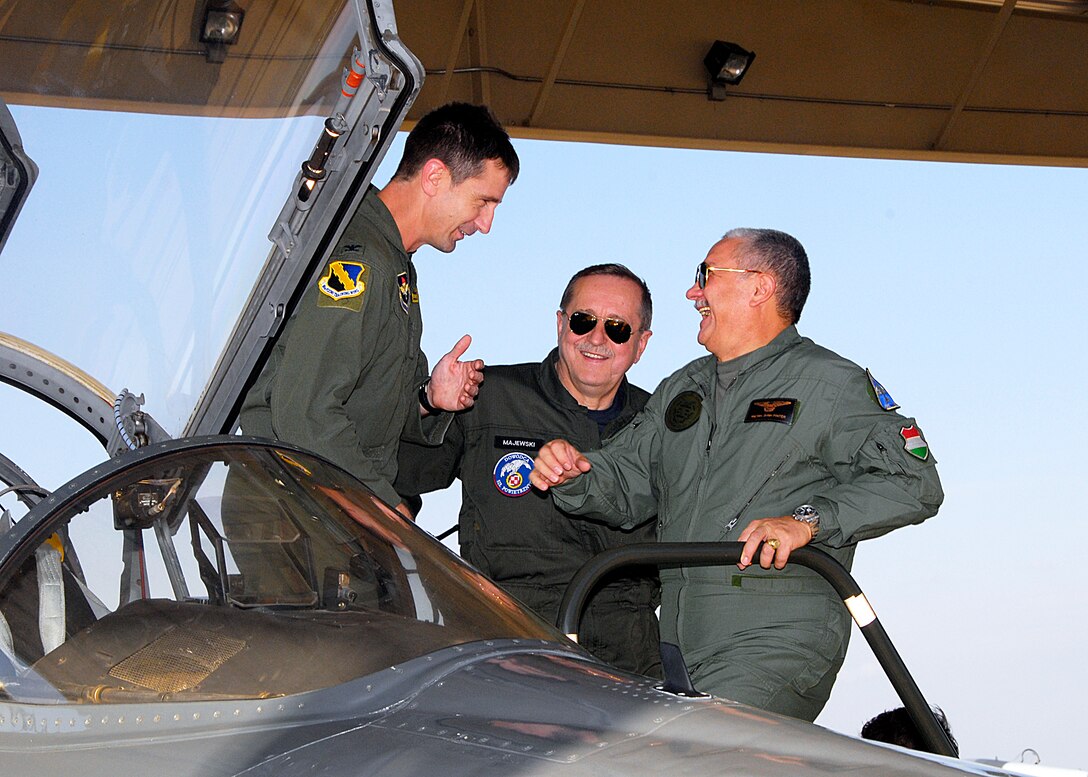 Col. Kevin Schneider, left, talks to Polish air force Lt. Gen. Lech Majewski, center, and Hungarian air force Maj. Gen. Zoltan Pinter Oct. 21 on the Euro-NATO Joint Jet Pilot Training Program aircraft ramp during a visit by NATO Air Chiefs. The chiefs visited Sheppard Air Force Base to get a first-hand look at training aircraft and flight simulators used to train combat pilots for NATO. (U.S. Air Force photo/Harry Tonemah)