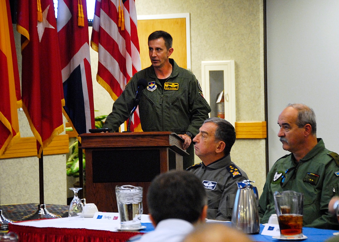 Col. Kevin Schneider, 80th Flying Training Wing commander, provides a brief to NATO Air Chiefs Oct. 21 in the Sheppard Club as part of the chiefs' visit to Sheppard Air Force Base, Texas. The group took a close up look at how the Euro-NATO Joint Jet Pilot Program trains combat pilots for the alliance. (U.S. Air Force photo/Harry Tonemah)