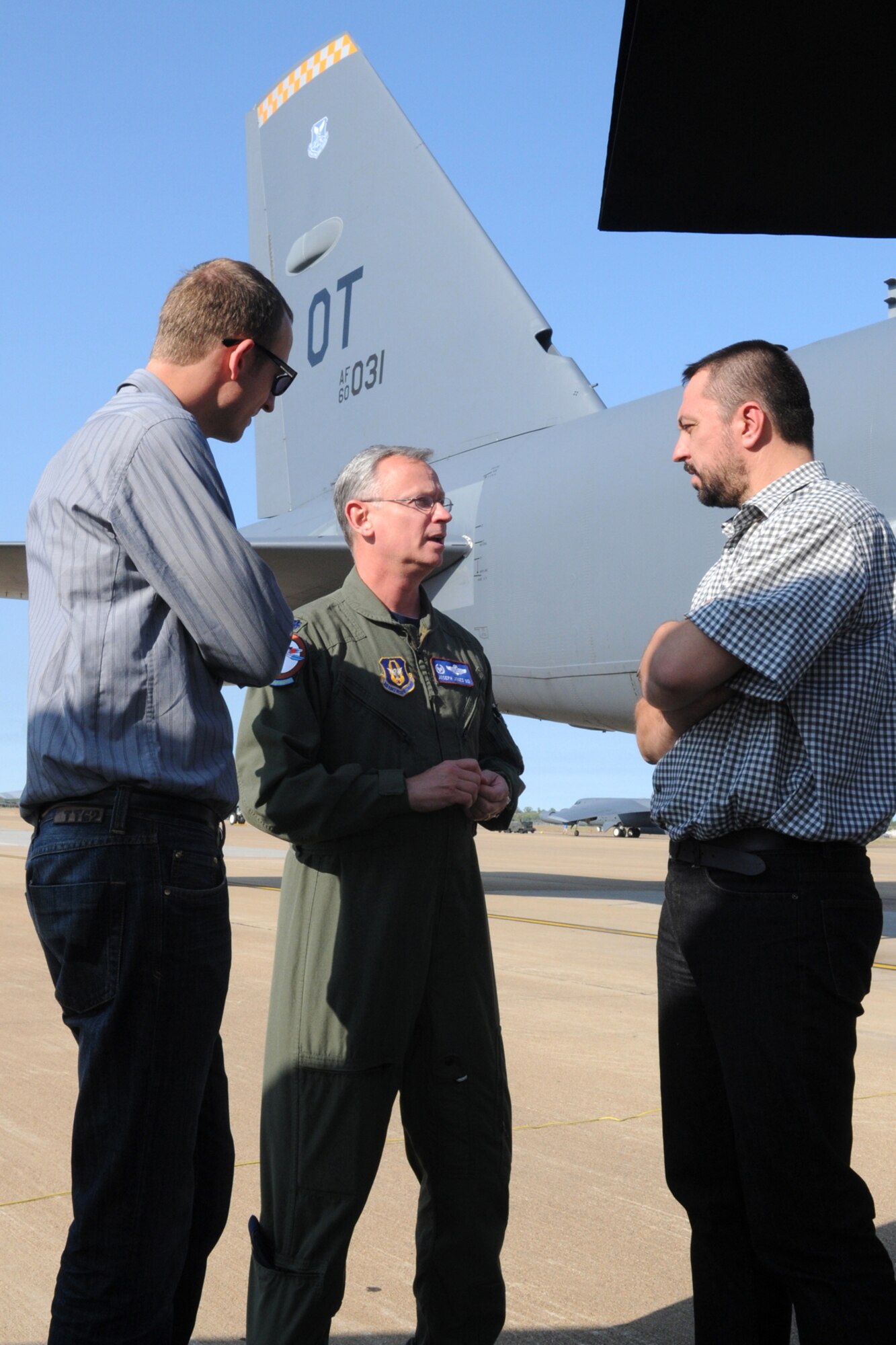 Lt. Col. Joseph Jones, 93rd Bomb Squadron commander, talks about the capabilities of the B-52H Stratofortress with Dr. Petr Zlatohlavek, North Atlantic Treaty Organization Information Center executive chairman, and Zbynek Pavlacik, Jagello 2000 Association chairman, during their visit to the 917th Wing, Barksdale Air Force Base, La., on Oct. 26, 2010. The Jagello 2000 Association is a top Czech Republic nonprofit, nongovernmental organization in the field of public and defense diplomacies, focusing on the presentation of NATO and security politics for the general public. It is also the main sponsor of the NATO Days in Ostrava air show, which was held Sept. 18-19, 2010, in Ostrava, Czech Republic. The 917th Wing supplied a B-52H Stratofortress and personnel in support of the air show, which marked the first-time a B-52 visited the Czech Republic. (U.S. Air Force photo/Master Sgt. Greg Steele)