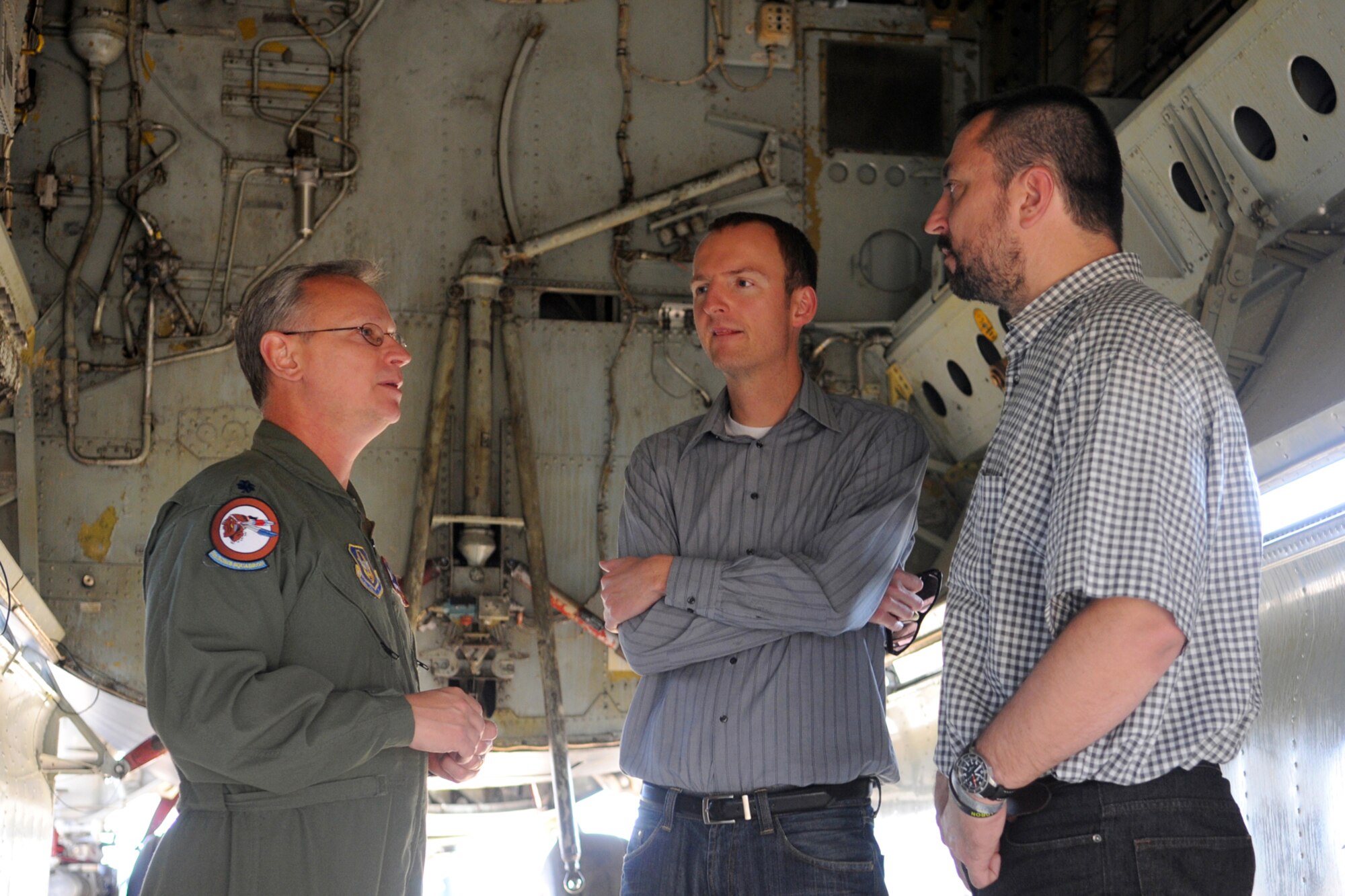 Lt. Col. Joseph Jones, 93rd Bomb Squadron commander, talks about the capabilities of the B-52H Stratofortress with Dr. Petr Zlatohlavek, North Atlantic Treaty Organization Information Center executive chairman, and Zbynek Pavlacik, Jagello 2000 Association chairman, during their visit to the 917th Wing, Barksdale Air Force Base, La., on Oct. 26, 2010. The Jagello 2000 Association is a top Czech Republic nonprofit, nongovernmental organization in the field of public and defense diplomacies, focusing on the presentation of NATO and security politics for the general public. It is also the main sponsor of the NATO Days in Ostrava air show, which was held Sept. 18-19, 2010, in Ostrava, Czech Republic. The 917th Wing supplied a B-52H Stratofortress and personnel in support of the air show, which marked the first-time a B-52 visited the Czech Republic. (U.S. Air Force photo/Master Sgt. Greg Steele)