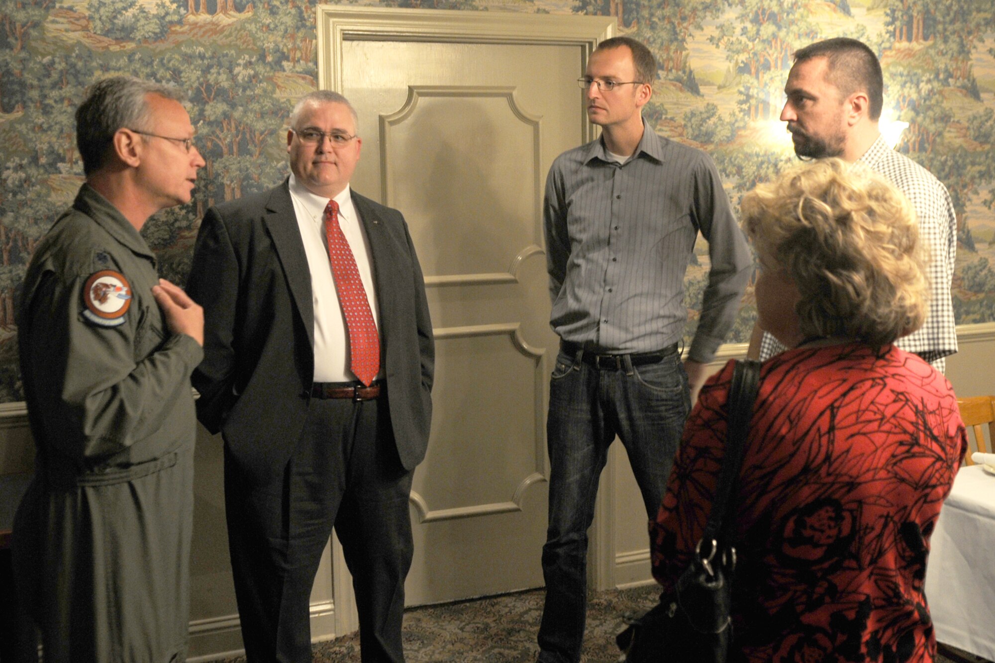 Lt. Col. Joseph Jones, 93rd Bomb Squadron commander, talks with Doug Rogers, Military Affairs Council president, Dr. Petr Zlatohlavek, North Atlantic Treaty Organization Information Center executive chairman, Zbynek Pavlacik, Jagello 2000 Association chairman, and Kathy Smith, MAC executive director, during Dr. Zlatohlavek and Mr. Pavlacik’s visit to the 917th Wing, Barksdale Air Force Base, La., on Oct. 26, 2010. The Jagello 2000 Association is a top Czech Republic nonprofit, nongovernmental organization in the field of public and defense diplomacies, focusing on the presentation of NATO and security politics for the general public. It is also the main sponsor of the NATO Days in Ostrava air show, which was held Sept. 18-19, 2010, in Ostrava, Czech Republic. The 917th Wing supplied a B-52H Stratofortress and personnel in support of the air show, which marked the first-time a B-52 visited the Czech Republic. (U.S. Air Force photo/Master Sgt. Greg Steele)