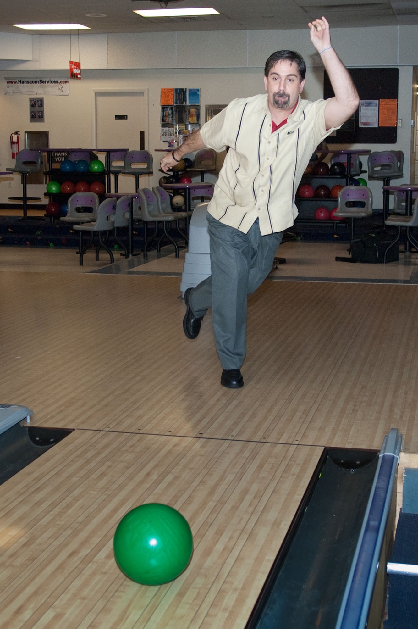 HANSCOM AIR FORCE BASE, Mass. – Michael Graybeal takes his turn at Hanscom Lanes. He recently bowled a perfect 300 during a league game. (U.S. Air Force photo by Rick Berry)