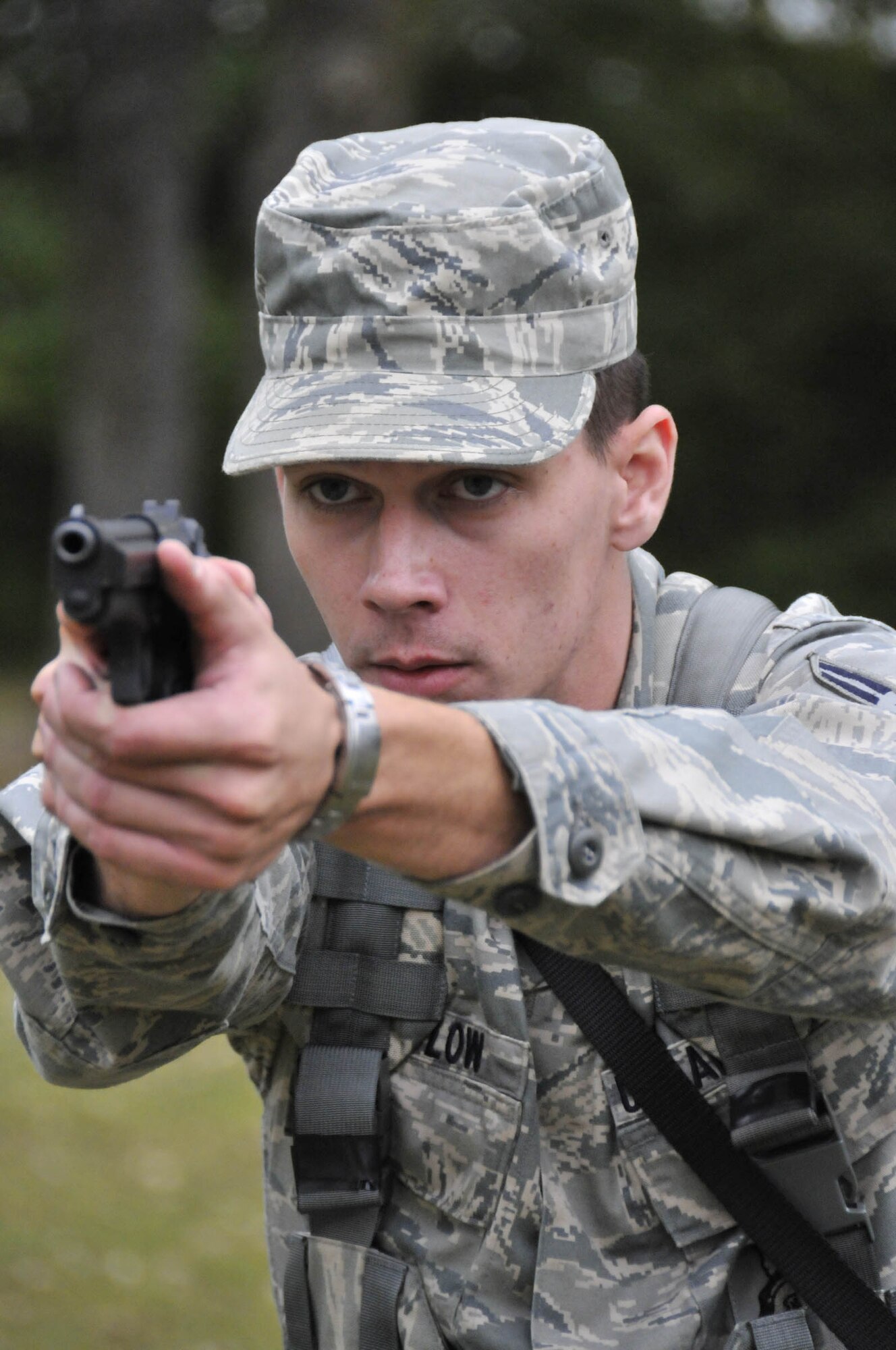 WRIGHT-PATTERSON AIR FORCE BASE, Ohio – Airman 1st Class Jeremy Whitlow, 445th Security Forces Squadron, practices maneuvering techniques during the Oct. 2 and 3 SFS shoot-move-communicate training at Powell Park in Xenia, Ohio. (U.S. Air Force photo/Master Sgt. John Koehl)