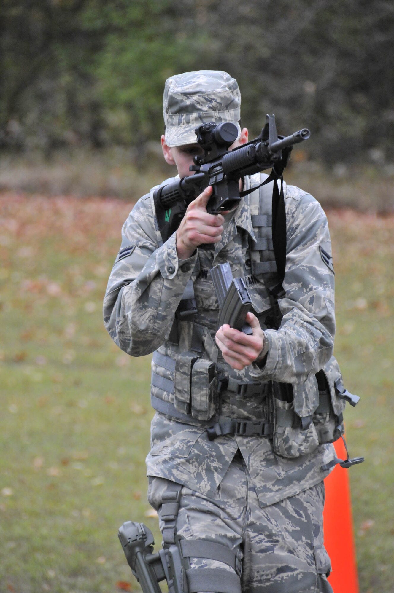 WRIGHT-PATTERSON AIR FORCE BASE, Ohio – Airman 1st Class Jeremy Whitlow, 445th Security Forces Squadron, practices maneuvering techniques during the Oct. 2 and 3 SFS shoot-move-communicate training at Powell Park in Xenia, Ohio. (U.S. Air Force photo/Master Sgt. John Koehl)