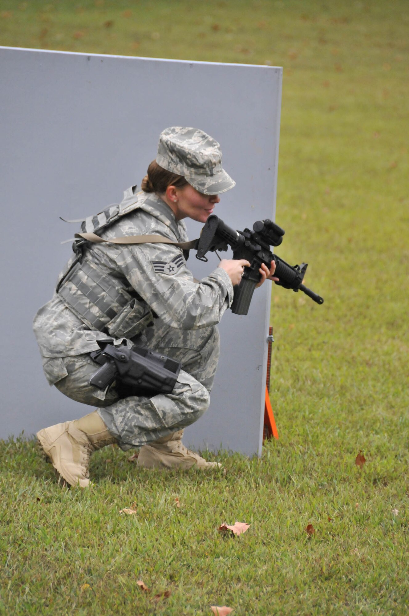 WRIGHT-PATTERSON AIR FORCE BASE, Ohio – Senior Airman Dawn Gettys, 445th Security Forces Squadron, practices maneuvering techniques during the Oct. 2 and 3 SFS shoot-move-communicate training at Powell Park in Xenia, Ohio. (U.S. Air Force photo/Master Sgt. John Koehl)