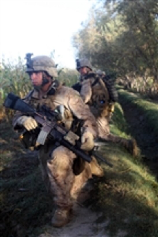 U.S. Marine Corps Lance Cpl. Jacob Blair, with India Company, 3rd Battalion, 5th Marine Regiment, Regimental Combat Team 2, provides security while conducting a patrol in Sangin Valley, Afghanistan, on Oct. 16, 2010.  Marines conducted security patrols to decrease insurgent activity and gain the trust of Afghan villagers.  The battalion was one of the combat elements of Regimental Combat Team 2, whose mission was to conduct counterinsurgency operations with the International Security Assistance Force.  