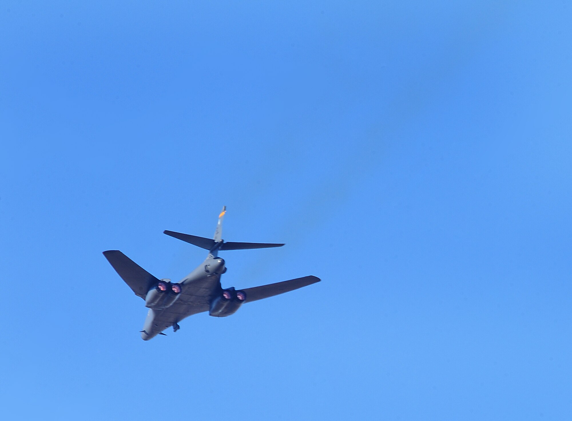 ELLSWORTH AIR FORCE BASE, S.D. -- A B-1B Lancer, with the 37th Bomb Squadron, flies overhead during a joint-nation training mission with Canadian Joint Terminal Attack Controllers in Alzada, MT, Oct. 28.  The B-1 is equipped with the Sniper advanced targeting pod that provides positive target identification, autonomous tracking, coordinate generation, and precise weapons guidance from extended standoff ranges supporting air to ground operations. (U.S. Air Force photo/Airman 1st Class Anthony Sanchelli)
