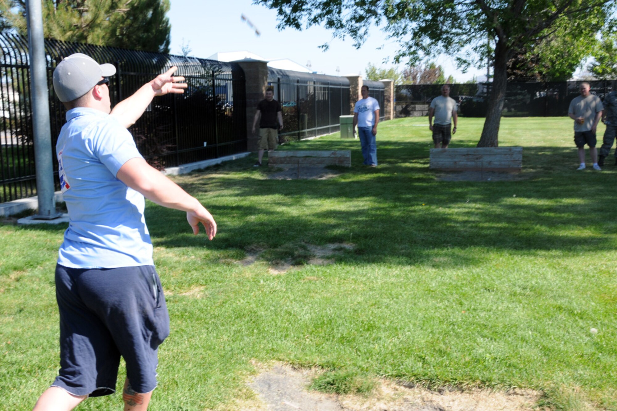 Members of the 173rd Fighter Wing play a game of horse shoes during the Wing End of Year celebration at Kingsley Field, Ore. Oct. 1, 2010.  (RELEASED, U.S. Air Force Photo by Tech. Sgt. Jefferson Thompson)