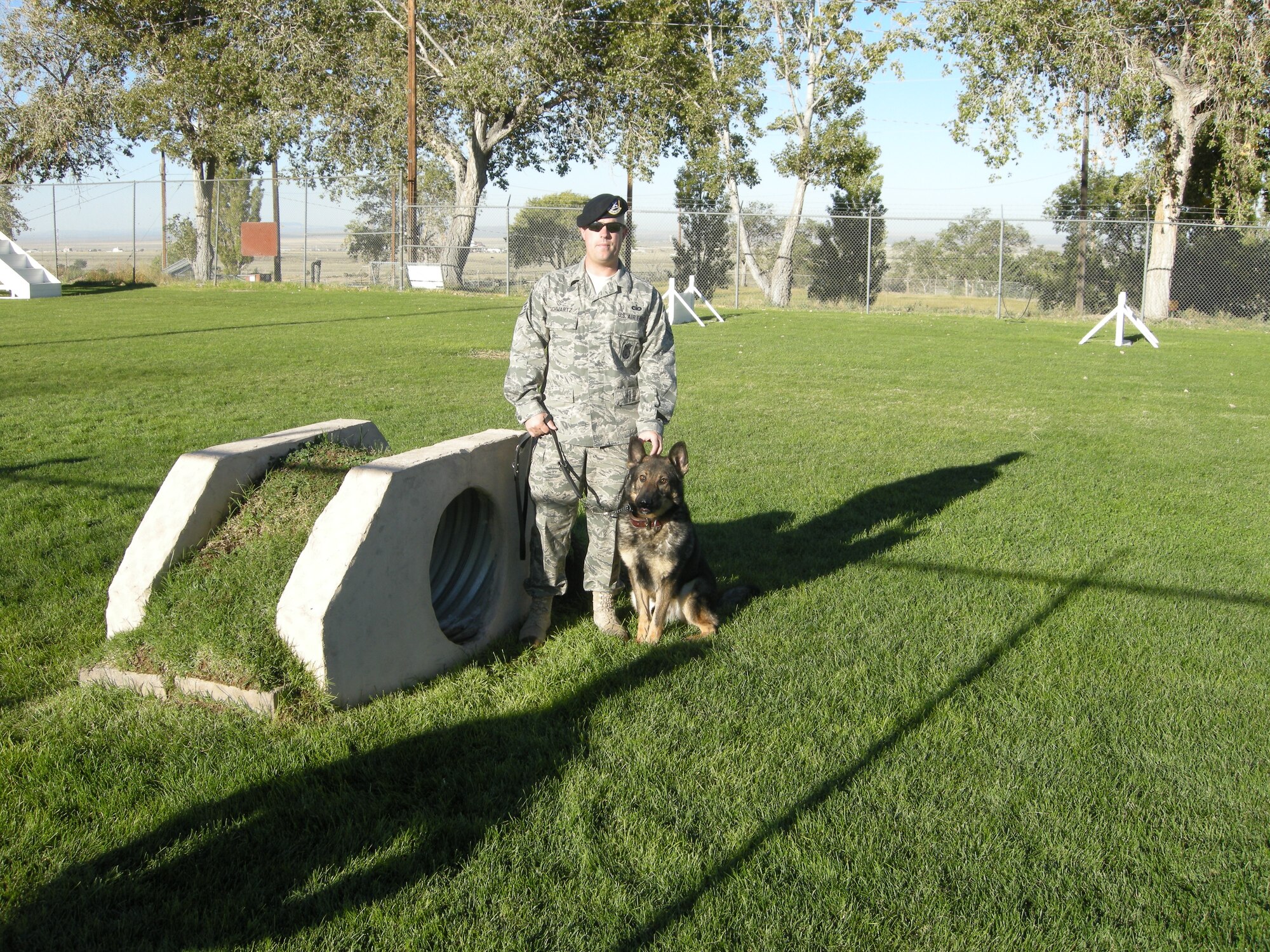 Staff Sgt. Michael Schwartz and Ori take a break from a training exercise.