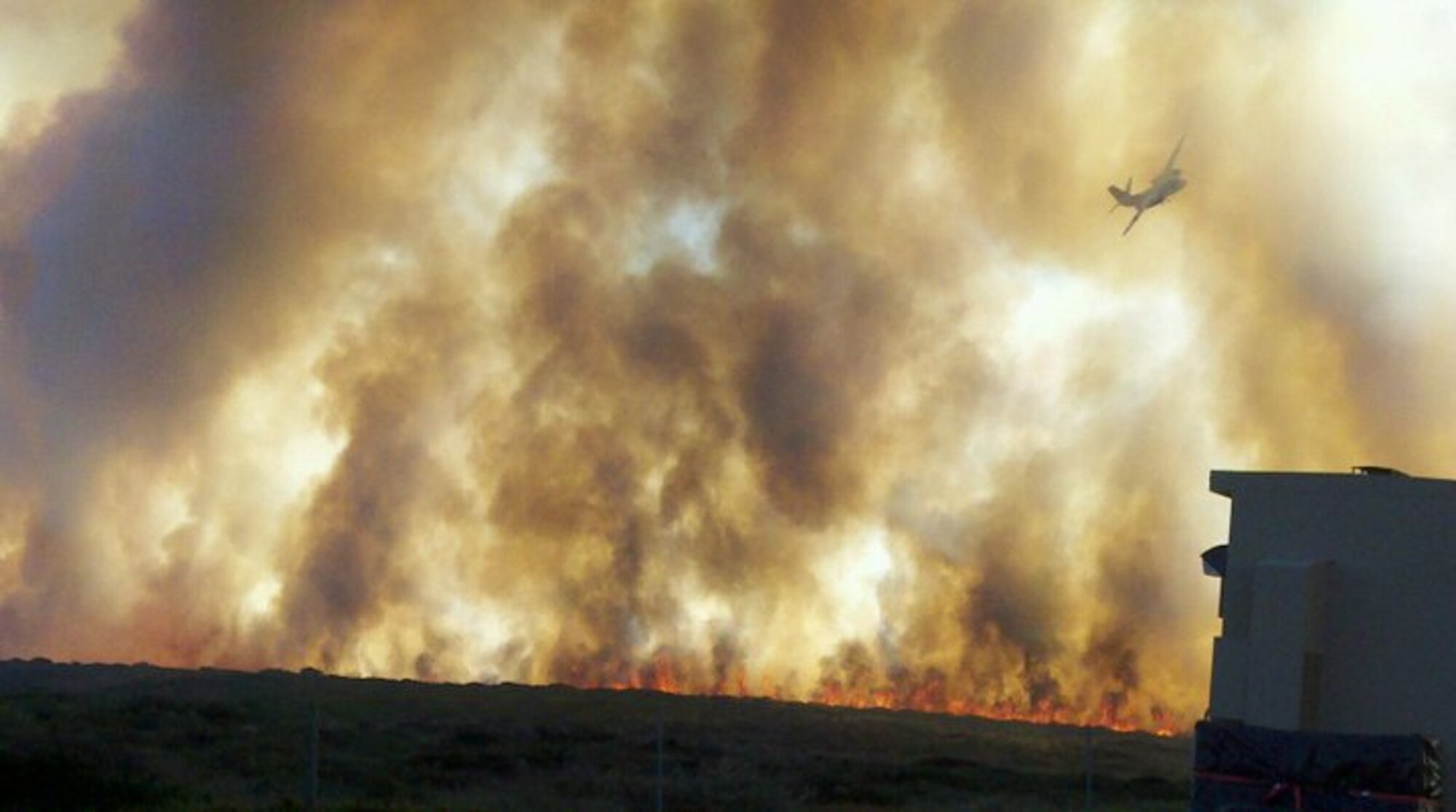 VANDENBERG AIR FORCE BASE, Calif.  -- An arcing power line is the cause of the Bear Creek Fire, which began here Thursday, Oct. 28, 2010, according to 30th Space Wing emergency officials. About 170 Vandenberg Fire Department and supporting emergency responders resumed work to extinguish the fire at 9 a.m. today. (Photo by Rich DiBuo)


