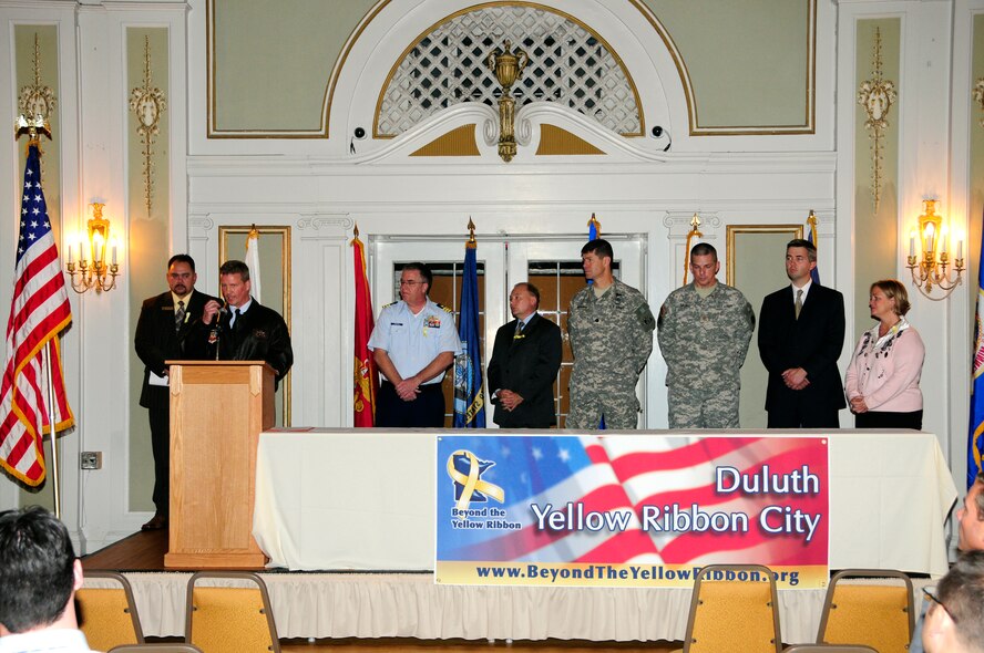 Lieutenant Colonel Jon S Safstrom speaks at the Yellow Ribbon ceremony held on Oct. 28, 2010 at the Greysolon Plaza in Duluth, Minn.  The event was held to celebrate Duluth's recognition as a Yellow Ribbon City from the culmination of work completed by the Beyond the Yellow Ribbon Steering Committee led by co-chairs Richard Dumancas and Jennifer Kuhlman, 148th Fighter Wing Airman and Family Readiness Program Manager.  (U.S. Air Force photo by SSgt Donald Acton)