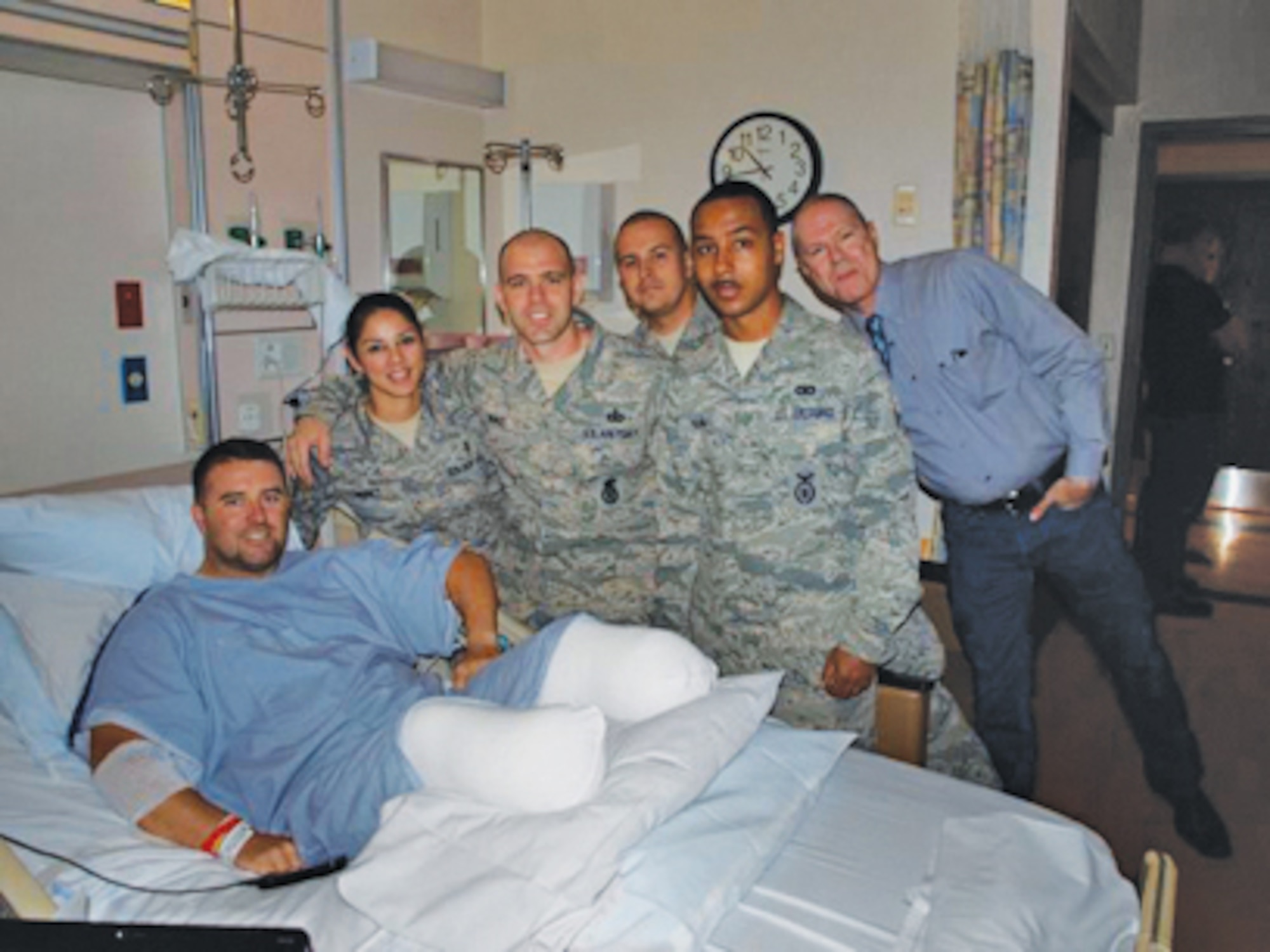 56th Security Forces Squadron members from Luke Air Force Base, Arizona, visit Steve Martin in the hospital after his surgery. (Courtesy photo)