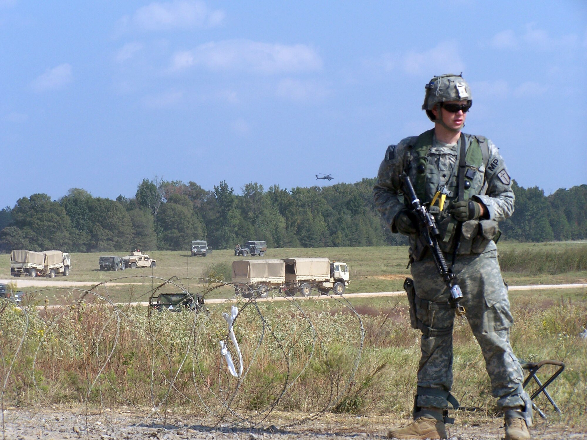 FORT POLK, LA. – An Army military policeman standing guard near the Close Air Support (CAS) town wears a Multiple Integrated Laser Engagement System vest instrumented to track individuals as they move around. (U.S. Air Force photo/Noel Getlin)