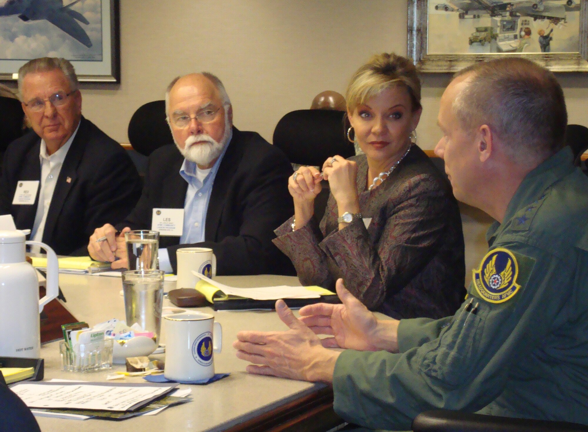 Gen. Donald Hoffman, commander of Air Force Materiel Command, meets with his
Community Liaison Program members Oct. 28, 2010, at command headquarters to discuss issues of mutual interest. Among those at the meeting were Rex Moen (from left) and Les Uhazy representing Edwards Air Force Base, Calif., communities; and Mary Therese Tebbe, representative from Robins Air Force Base, Ga., communities and chairperson of the group.
