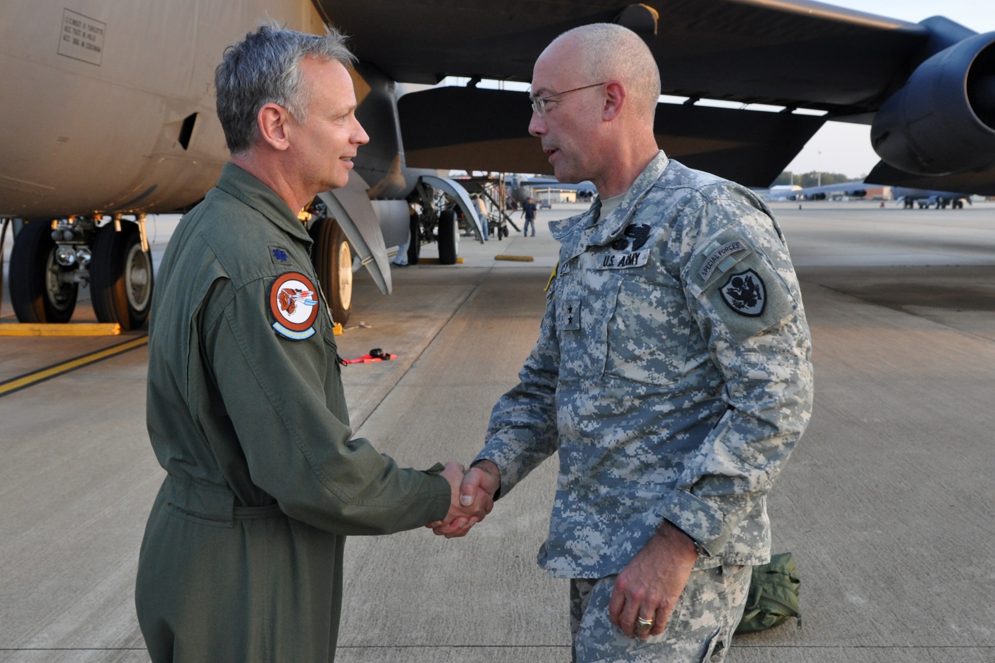 Lt. Col. Joseph Jones, commander of the 93rd Bomb Squadron at Barksdale Air Force Base, La., receives a thank you from Maj. Gen. Charles D. Luckey after a training sortie in a B-52 Stratofortress Oct. 27, 2010. General Luckey, who is a U.S. Army officer, is the Assistant to the Chairman of the Joint Chiefs of Staff for Reserve Matters. He was visiting the 917th Wing at Barksdale to get a general feel for issues affecting the Reserve component. This was his first flight in a B-52. (U.S. Air Force photo/Tech. Sgt. Jeff Walston) 