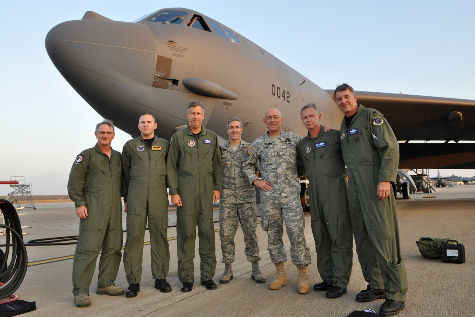 Tech. Sgt. Jeff Walston, 917th Wing, public affairs technician, Capt. Joseph Barkley, radar navigator, 11th Bomb Squadron, attached to the 93rd Bomb Squadron,  Lt. Cols Robert Burgess, 93rd BS instructor pilot, John Larson, strategic planner, ACJCS for NGRM, Assistant to the Chairman of the Joint Chiefs of Staff for Reserve Matters, U.S Army, Maj. Gen. Charles D. Luckey, Lt. Cols Joseph Jones, commander of the 93rd BS, and Robert Vanhoy, 93rd BS command pilot, pose for a picture on the ramp at Barksdale Air Force Base, La., after a training sortie in a 917th Wing B-52 Stratofortress Oct. 27, 2010.  This was the first B-52 flight for General Luckey and Sergeant Walston. Unfortunately, Colonel Larson was not able to make the flight, but snuck into the picture anyway. (U.S. Air Force photo/Senior Master Sgt. Jessica Daurizio)    
